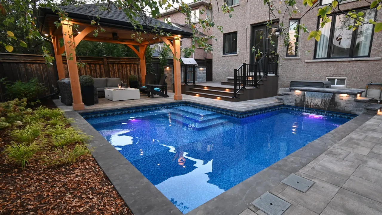 Custom backyard pavilion built by a Burlington landscaping company