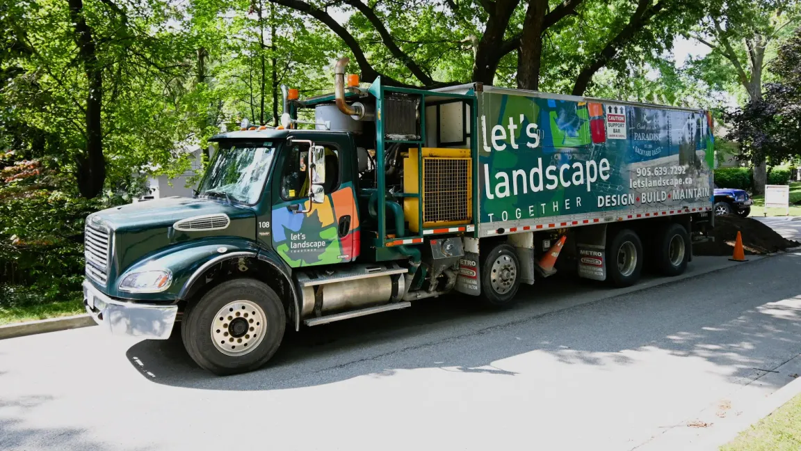 Our Blower Truck out front of a property ready to install mulch