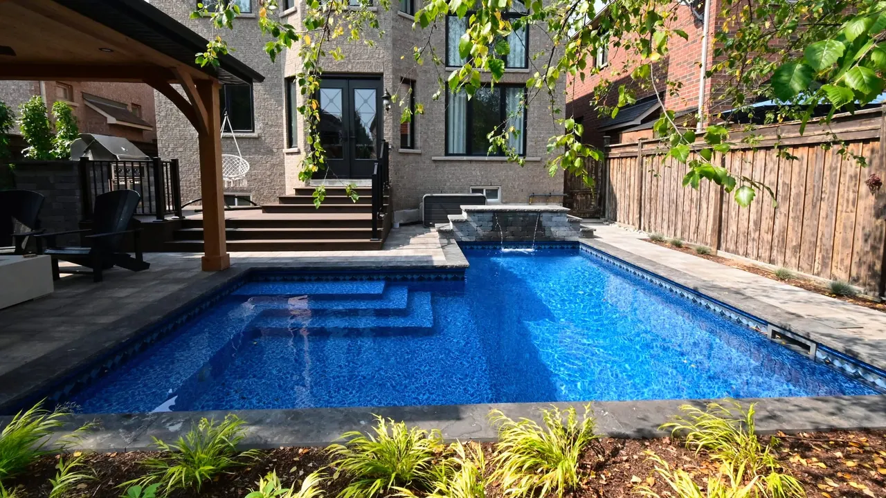 Luxury swimming pool with outdoor kitchen