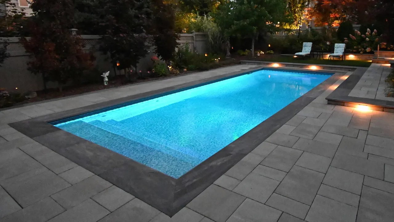 Modern swimming pool with sun shelf