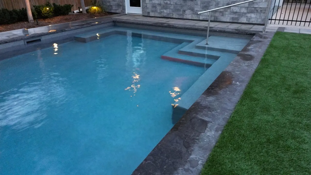 Custom swimming pool with beach entry